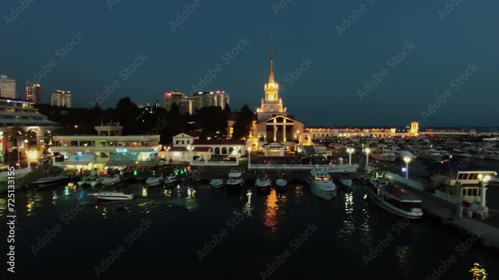 Vessels on moorage in Sea port at summer evening. Aerial view Vessels on moorage in Sea port at summer evening. Aerial view
