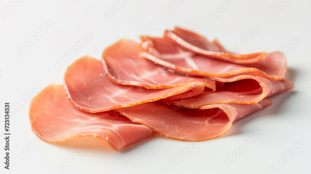 Close-up view of thinly sliced prosciutto ham, delicately arranged showcasing its tenderness and delicacy Close-up view of thinly sliced prosciutto ham, delicately arranged showcasing its tenderness and delicacy