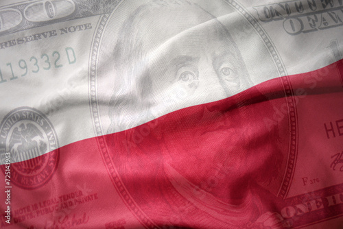 waving colorful flag of poland on a american dollar money background. finance concept.