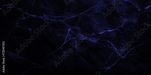 Wide surface of navy marble abstract stone texture with blue veins sapphire tone. For wallpaper, banner, background design images