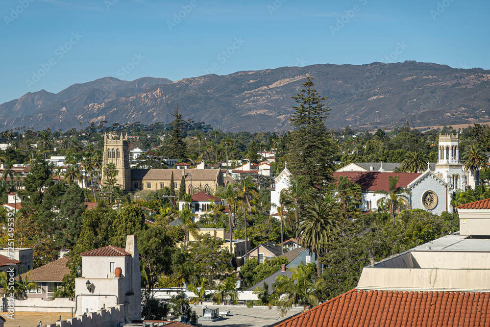 Santa Barbara, CA, USA - November 30, 2023: Santa Barbara County Courthouse lookout tower view on Trinity Episcopal and Catholic Our Lady of Sorrows churches. Santa Ynez mountains