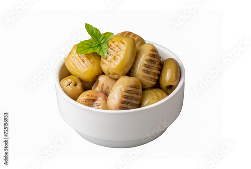 Grilled green olives. Tasty organic green olives in the plate. photo