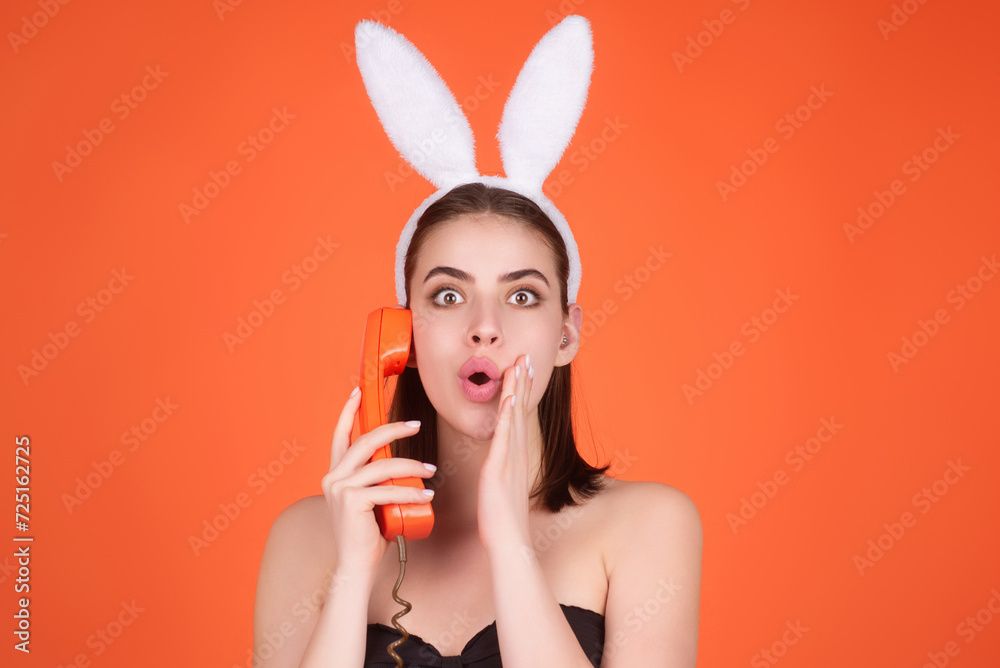 Close up photo of pretty girl wear easter fluffy bunny ears hold easter eggs, isolated studio background. Eater portrait of female bunny. Close up photo of pretty girl wear easter fluffy bunny ears hold easter eggs, isolated studio background. Eater portrait of female bunny.