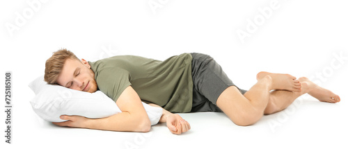 Sleeping young man with pillow on white background