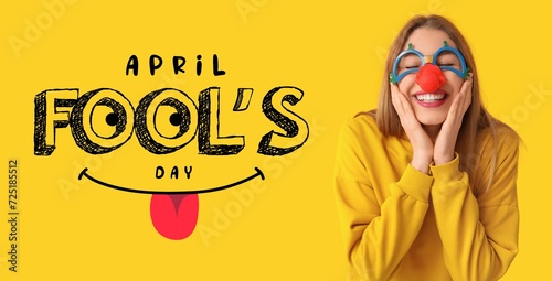 Banner for April Fools' Day with funny young woman in disguise on yellow background