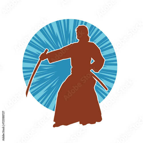 Silhouette of a sword warrior in action pose. Silhouette of a martial art person carrying sword weapon. Silhouette of kendo martial art pose.