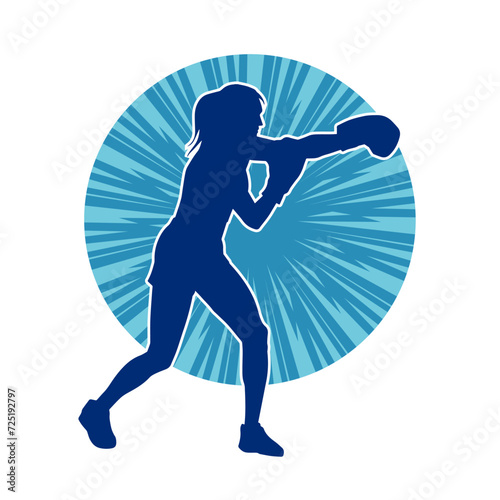 Silhouette of woman boxing athlete in action pose. Silhouette of a female wearing boxing gloves for boxing sport.