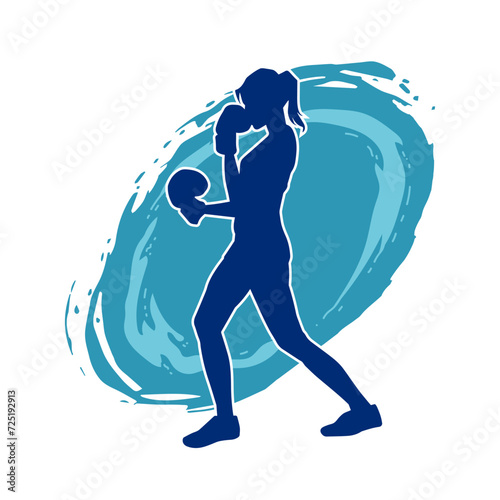 Silhouette of woman boxing athlete in action pose. Silhouette of a female wearing boxing gloves for boxing sport.