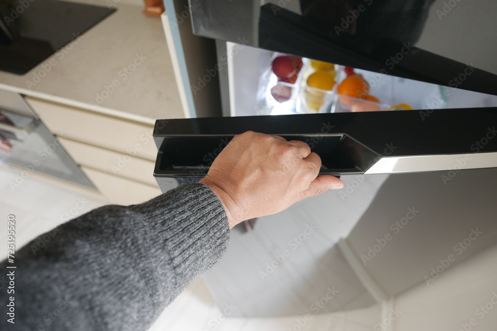 Obraz premium half open fridge with food and vegetables ,