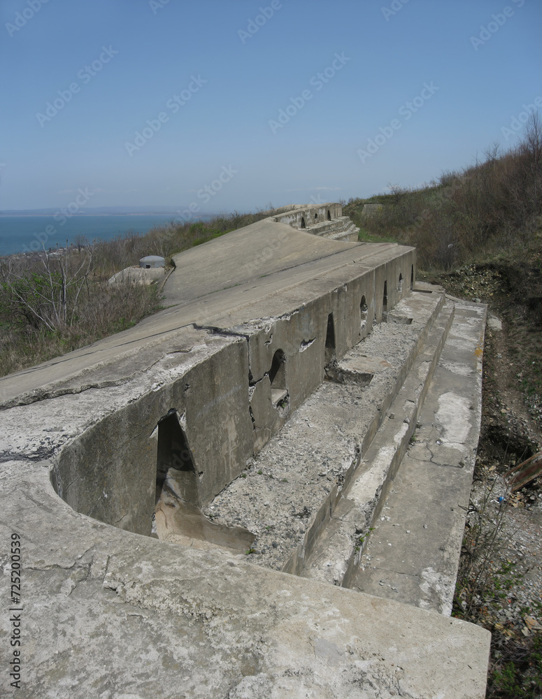 Strong concrete breastwork of abandoned Vladivostok fortress coastal fortification buildings 