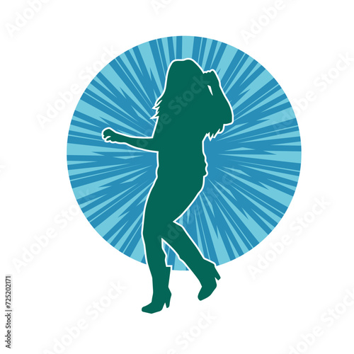 Silhouette of a slim male in dance pose. Silhouette of a man dancing. photo