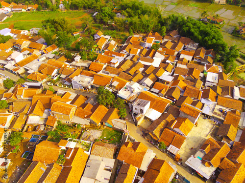 Top view of Dense Housing. Aerial Photography. Aerial panorama over the dense housing complex. Shot from a drone flying 200 meters high. Cikancung, Indonesia