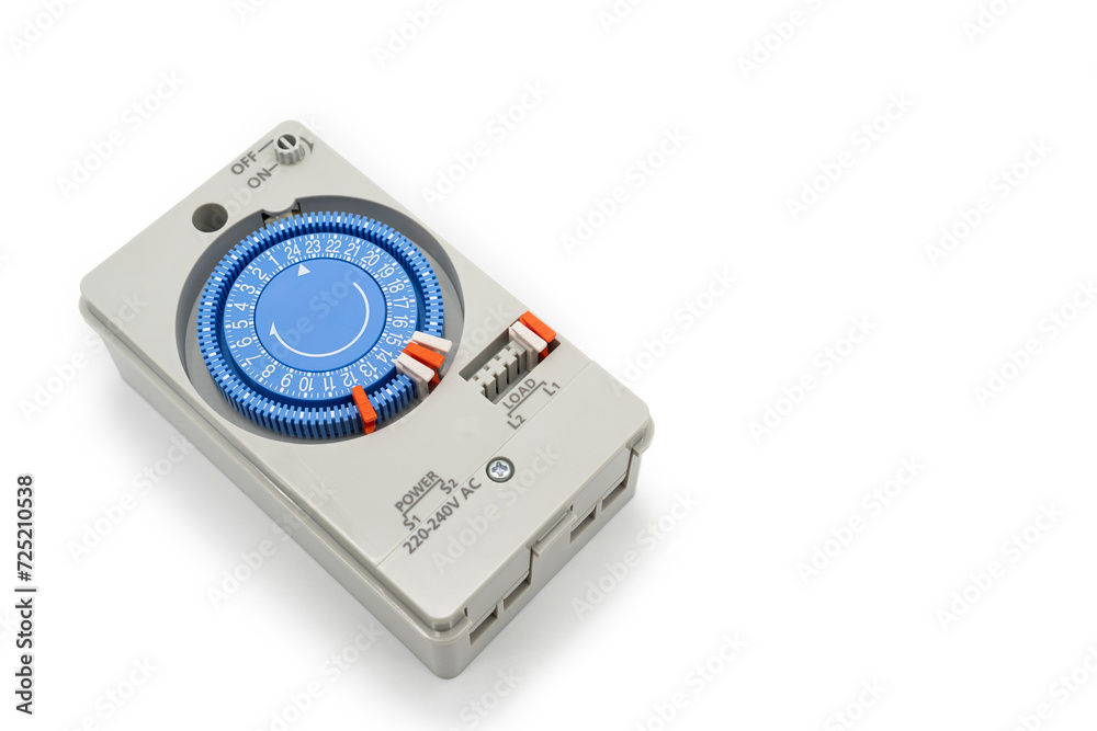 Mechanical timer switch isolated on white background. Electrical Analog timer for control AC switching 24 hours Daily programmable, Circuit control for mechanical timer industry. Mechanical timer switch isolated on white background. Electrical Analog timer for control AC switching 24 hours Daily programmable, Circuit control for mechanical timer industry.