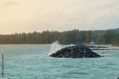 Rock bridge Breakwater Work for Wave Protection or Shoreline Beach Erosion Control, Revetment, Coastal Engineering Structure, Waves that hit the shore violently.