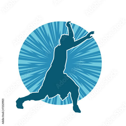 Silhouette of a man in dancing pose. Silhouette of a male dancer in performing pose.