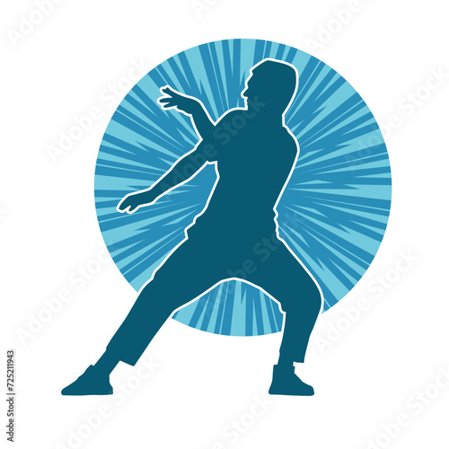 Silhouette of a man in dancing pose. Silhouette of a male dancer in performing pose.