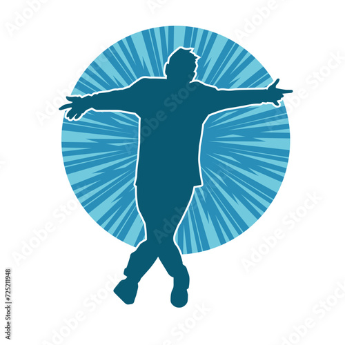 Silhouette of a man in dancing pose. Silhouette of a male dancer in performing pose.