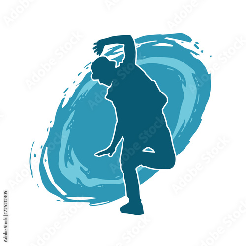 Silhouette of a man in dancing pose. Silhouette of a male dancer in performing pose.