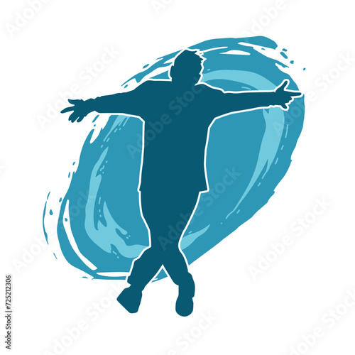 Silhouette of a man in dancing pose. Silhouette of a male dancer in performing pose.