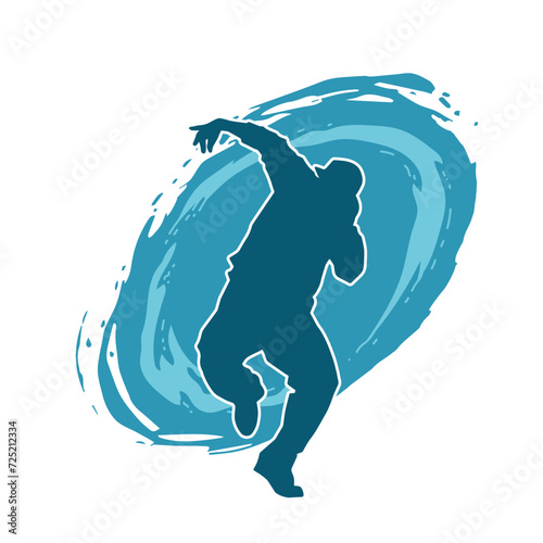 Silhouette of a man in dancing pose. Silhouette of a male dancer in performing pose.