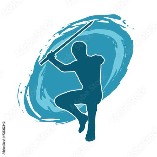 Silhouette of a male warrior in action pose with sword weapon. Silhouette of a man fighter carrying sword weapon.