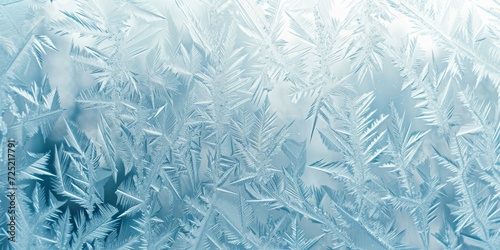 Frosty window pattern, with intricate ice crystals and a soft bluish hue, creating a cold, wintry feel