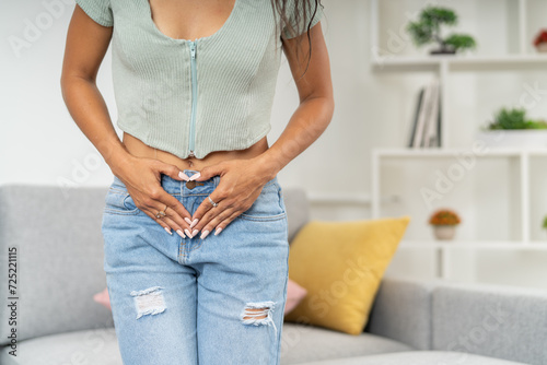 Woman touching her belly feeling menstruation pain