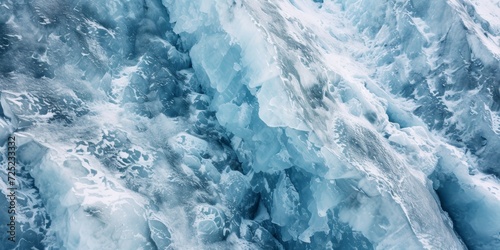 Icy glacier texture, with deep cracks and crevices in shades of white and pale blue, embodying the beauty of frozen landscapes © BackgroundWorld