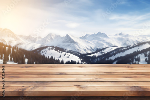 Wooden table top on mountain background. For montage product display © Creative