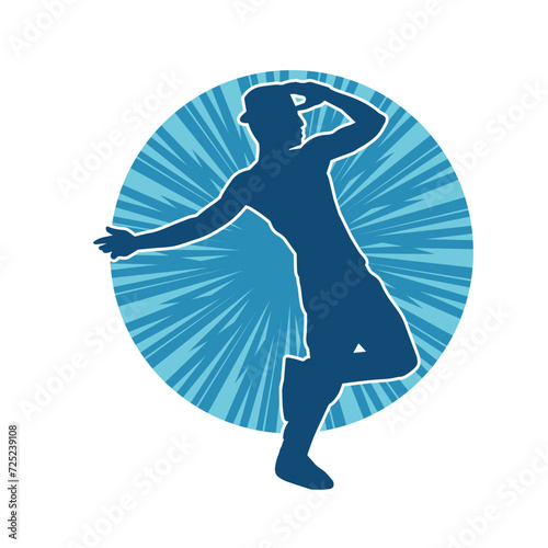 Silhouette of a man in dancing pose. Silhouette of a male dancer in performing pose. © anom_t