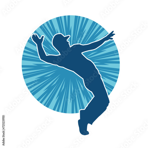 Silhouette of a man in dancing pose. Silhouette of a male dancer in performing pose.