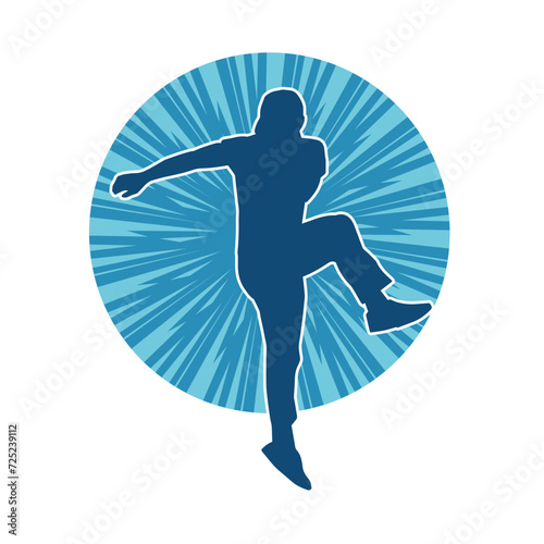 Silhouette of a man in dancing pose. Silhouette of a male dancer in performing pose.