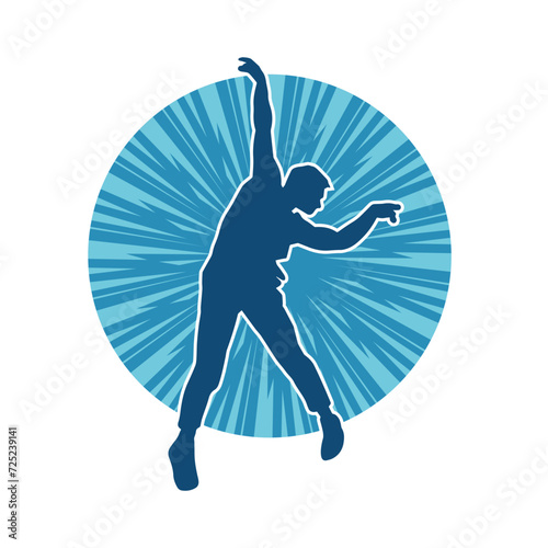 Silhouette of a man in dancing pose. Silhouette of a male dancer in performing pose.