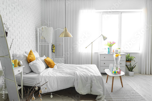 Interior of light bedroom d...