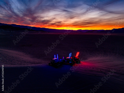 Fototapeta Naklejka Na Ścianę i Meble -  UTVs Desert Sunset Whips Sunsest