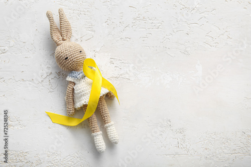 Golden ribbon with toy bunn...