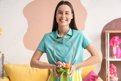 Young woman with basket of ...