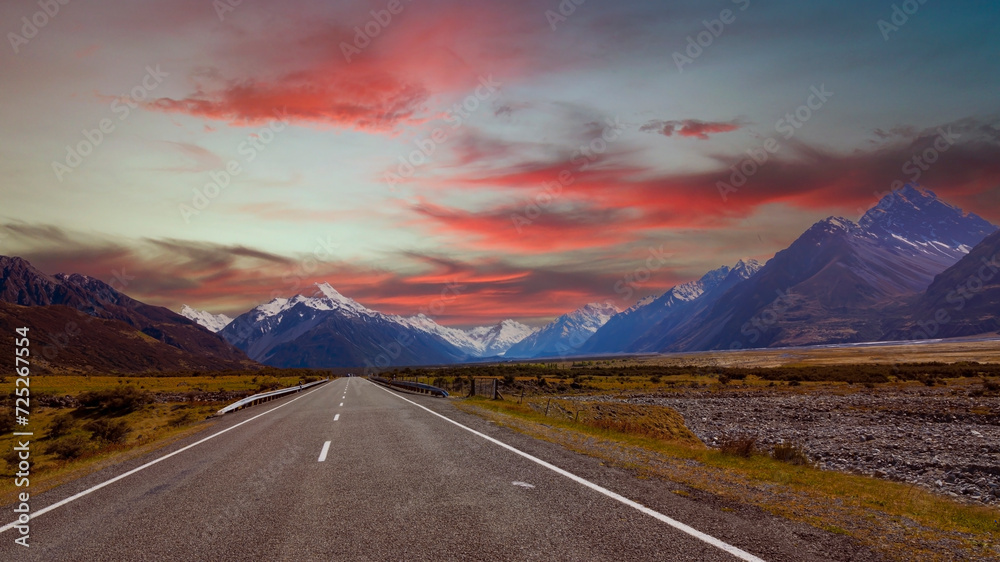 Sunset view with  mountain range near Aoraki Mount Cook and the road leading to Mount Cook Village in New zealand
