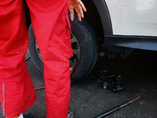 officers checking the condition of car tires.