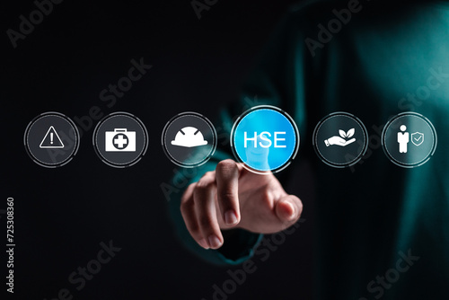 HSE, Health safety environment concept. Person touch virtual HSE icon for business and organization. Standard safe industrial work and industrial.