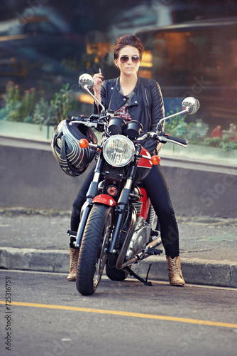 Motorcycle  leather and woman in city with cigarette for travel  transport or road trip as rebel. Fashion  street and smoke with model on classic or vintage bike for transportation or journey