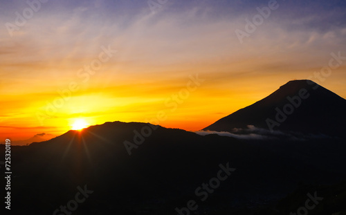 Sunrise with the foreground of Mount Sindoro