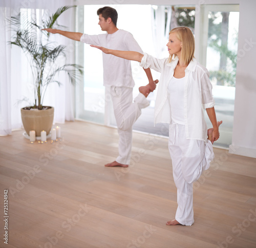 Yoga, stretching and couple do pilates in home for wellness, mindfulness and training. Fitness, exercise and man and woman balance in house for bonding, healthy body and workout together in morning