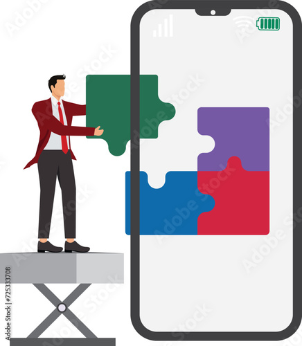 Businessman putting a Jigsaw Piece into a mobile phone to complete jigsaw puzzles