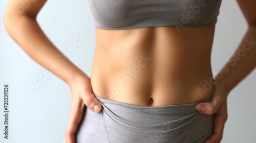 Close-up of flat stomach woman