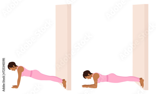 A woman does exercises near the wall. Wall Pilates.