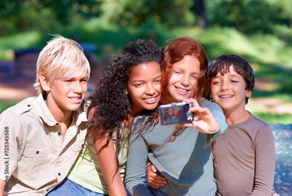 Children, friends and embrace outdoors in selfie for social media, camera and memories. Photograph, technology and profile picture on holiday or vacation in nature, smile and hug in post update Children, friends and embrace outdoors in selfie for social media, camera and memories. Photograph, technology and profile picture on holiday or vacation in nature, smile and hug in post update