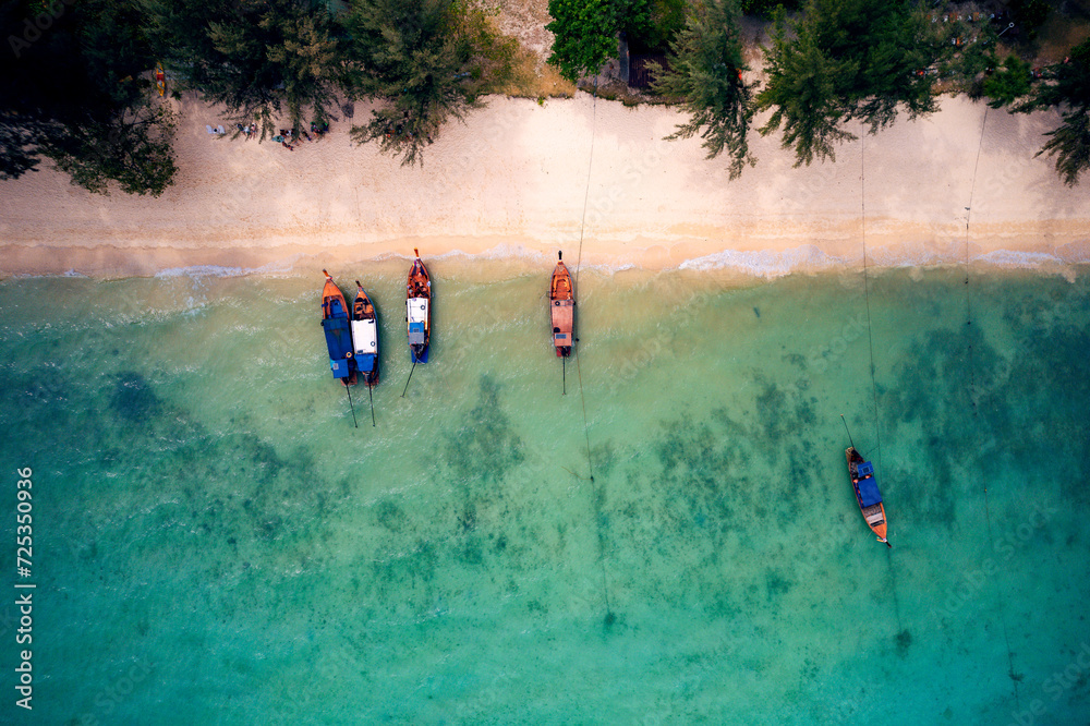 A breathtaking aerial view captures the pristine beauty of Krabi's enchanting island, adorned with turquoise waters and lush greenery