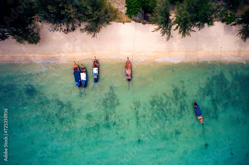 Obraz na płótnie A breathtaking aerial view captures the pristine beauty of Krabi's enchanting island, adorned with turquoise waters and lush greenery w salonie