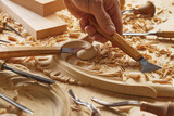 Carpenter working on wooden furniture with hand carving. Wood carving art with hand tools Close-up photo